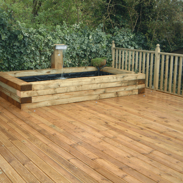 Decking with built in pond in essex