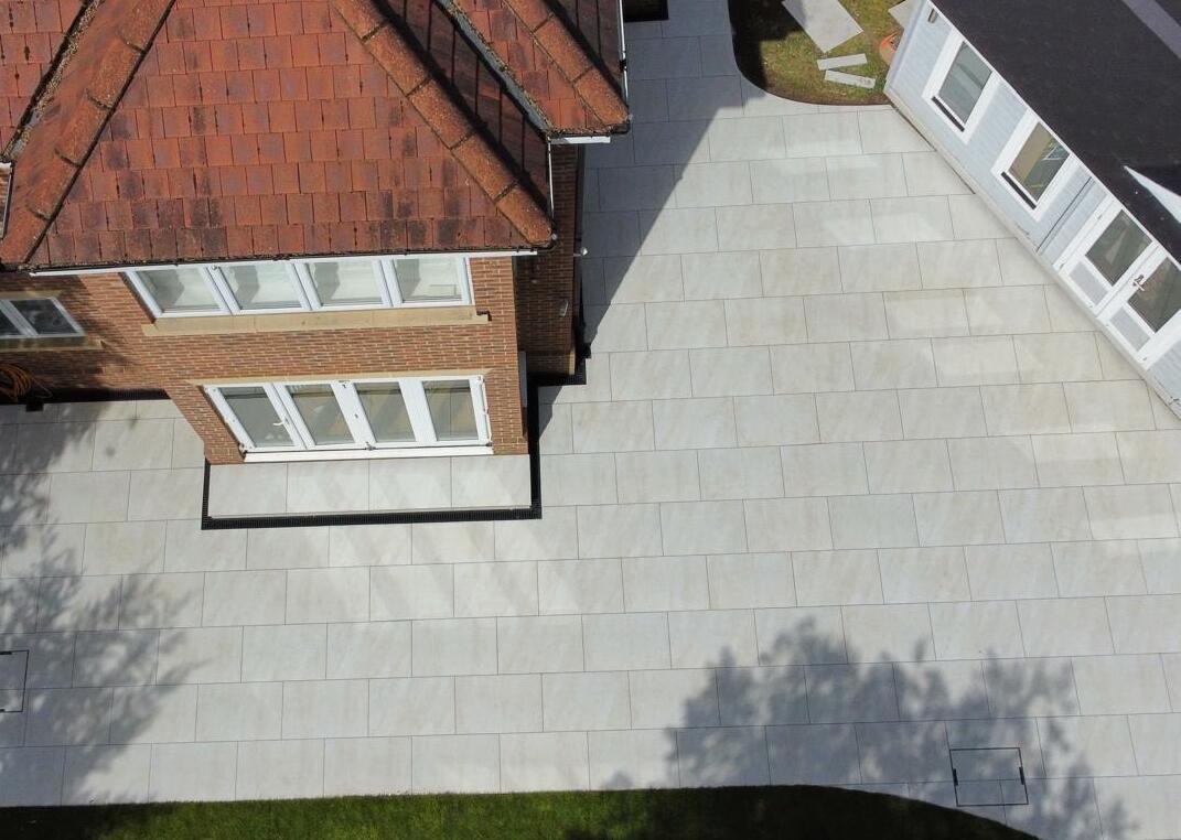 Porcelain patio and step installed Rainham essex using pearl white porcelain slabs