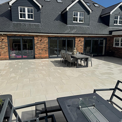 Porcelain patio using lake pearl white paving slabs, essex