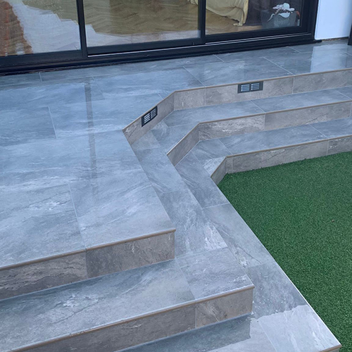 Porcelain patio and steps using Earthcore Grey slabs in Romford havering essex