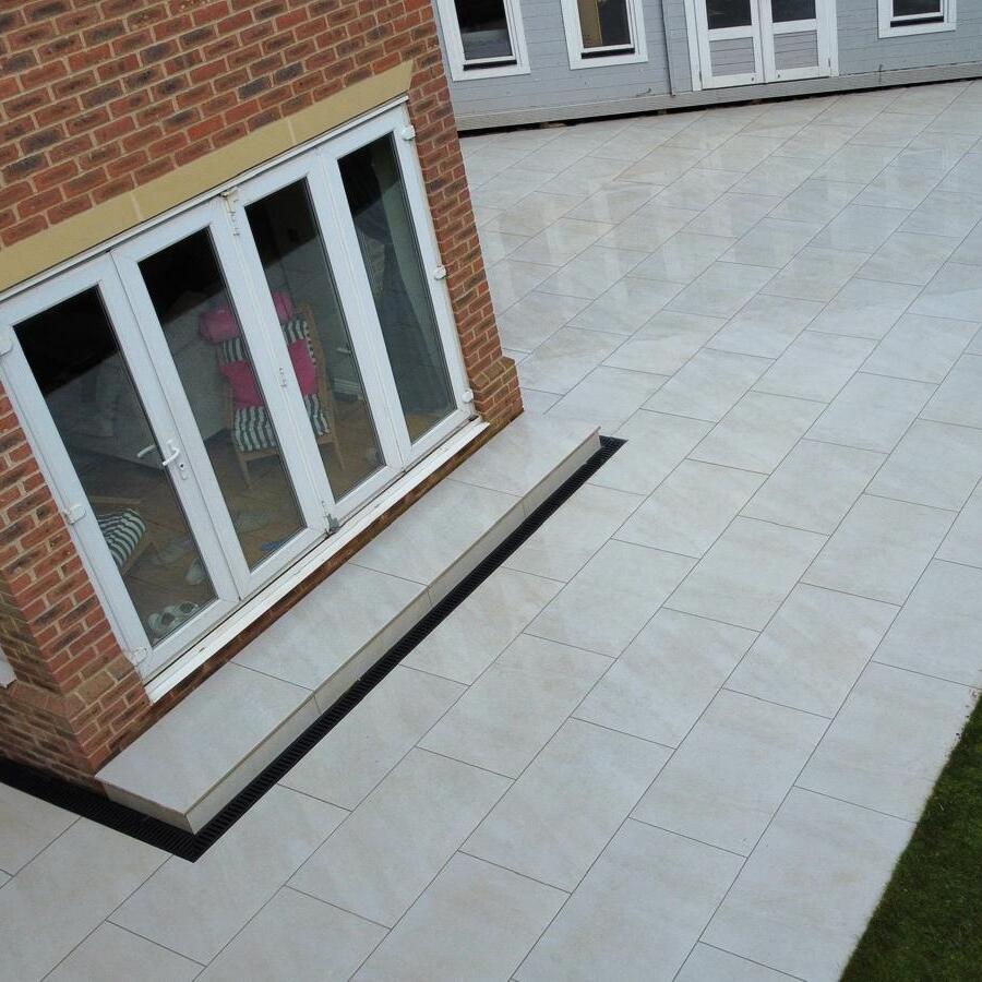 Porcelain patio and step installed Rainham essex using pearl white porcelain slabs