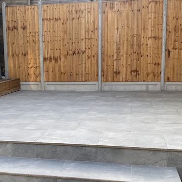 Porcelain patio and steps bullnosed, flower beds and fencing in Romford essex